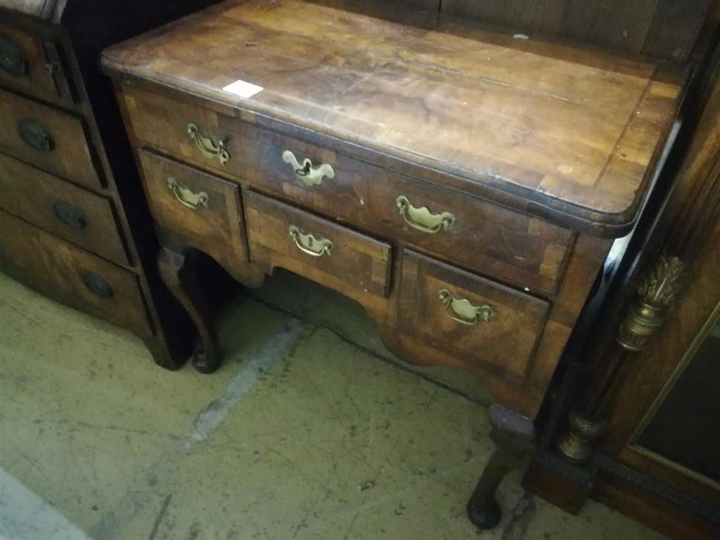 An early 18th century walnut lowboy, fitted four drawers, width 74cm, depth 44cm, height 71cm